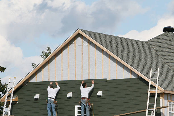 Professional Siding Installation technician working in Windham, OH